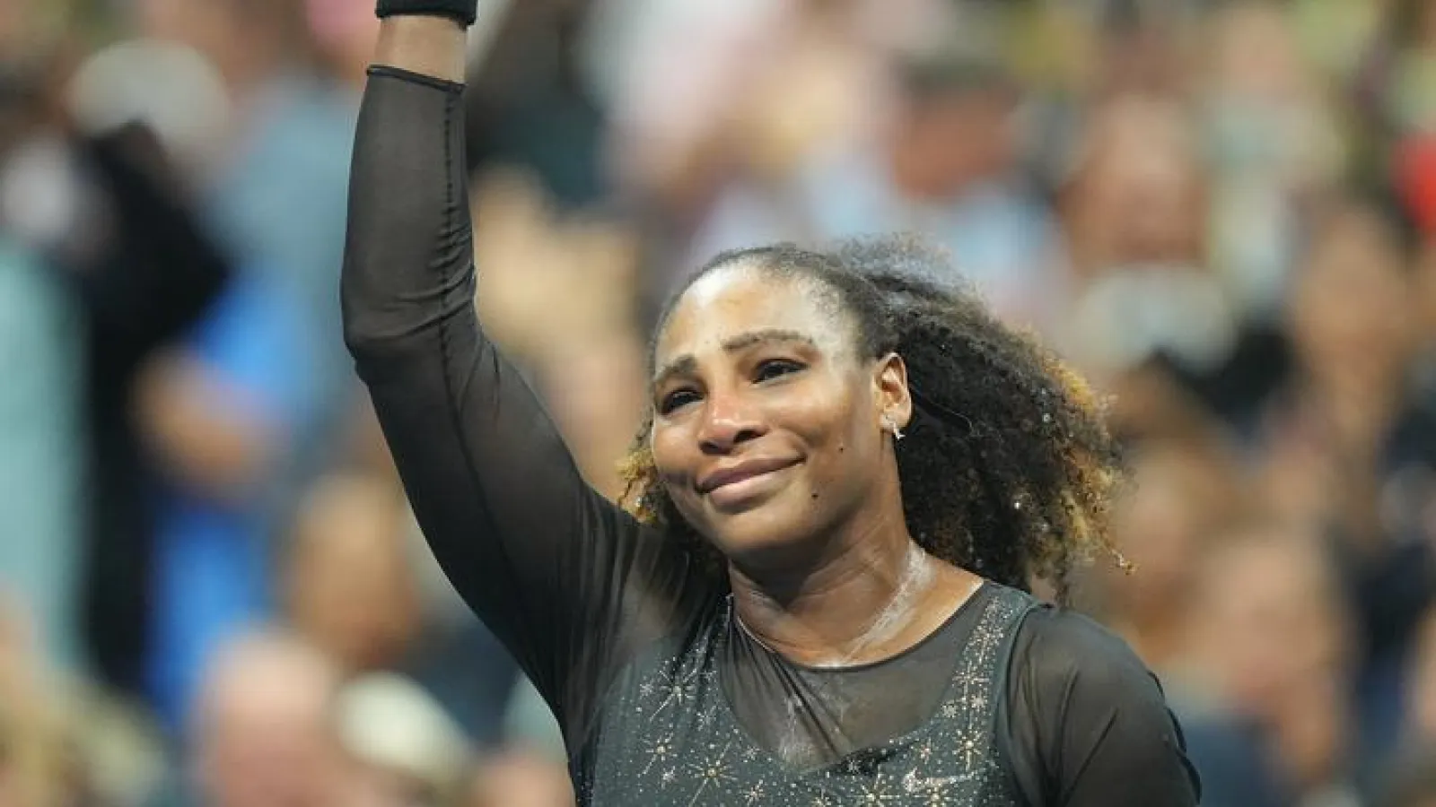 Serena Williams waves goodbye