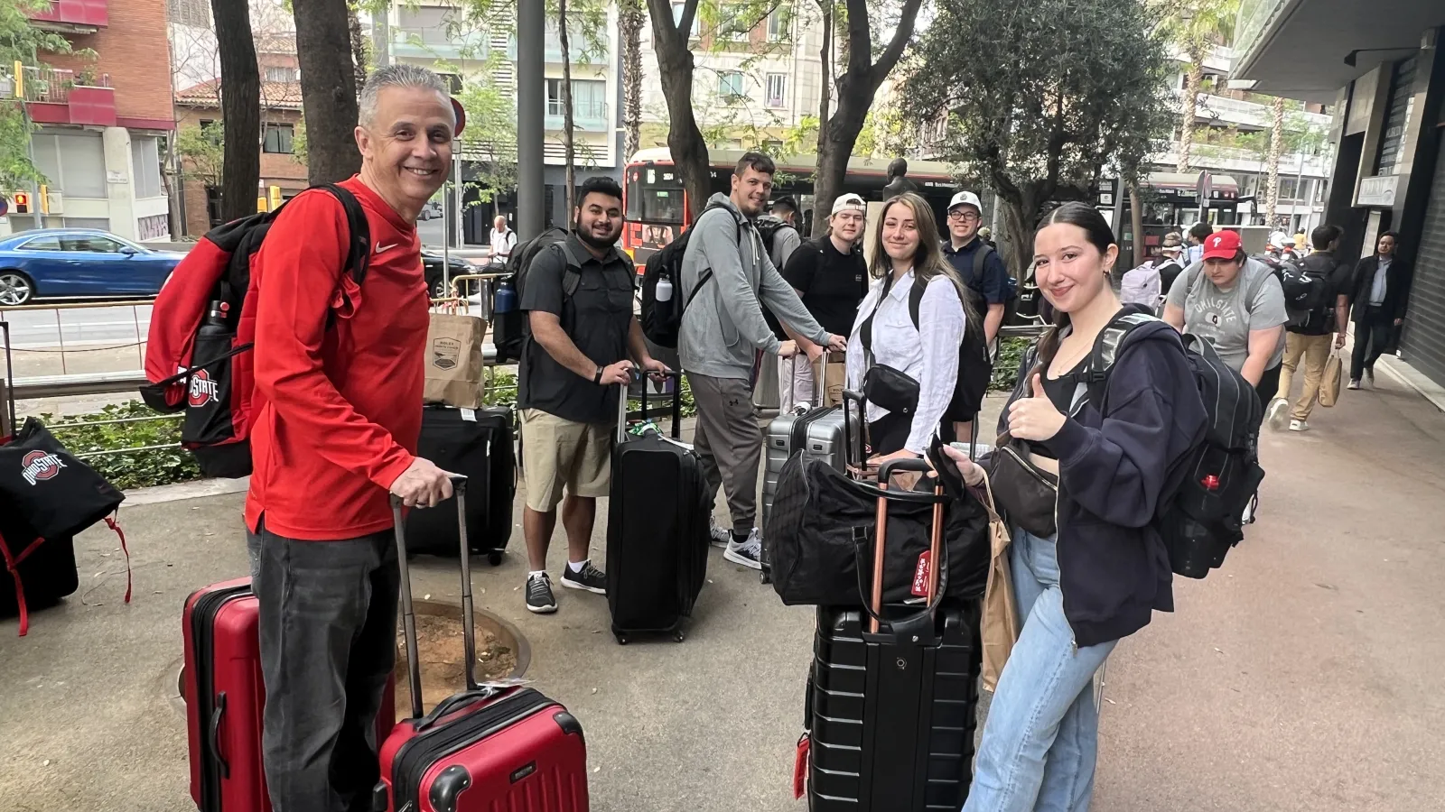 students with suitcases