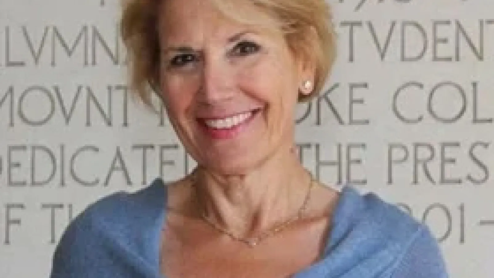 Woman in blue sweater