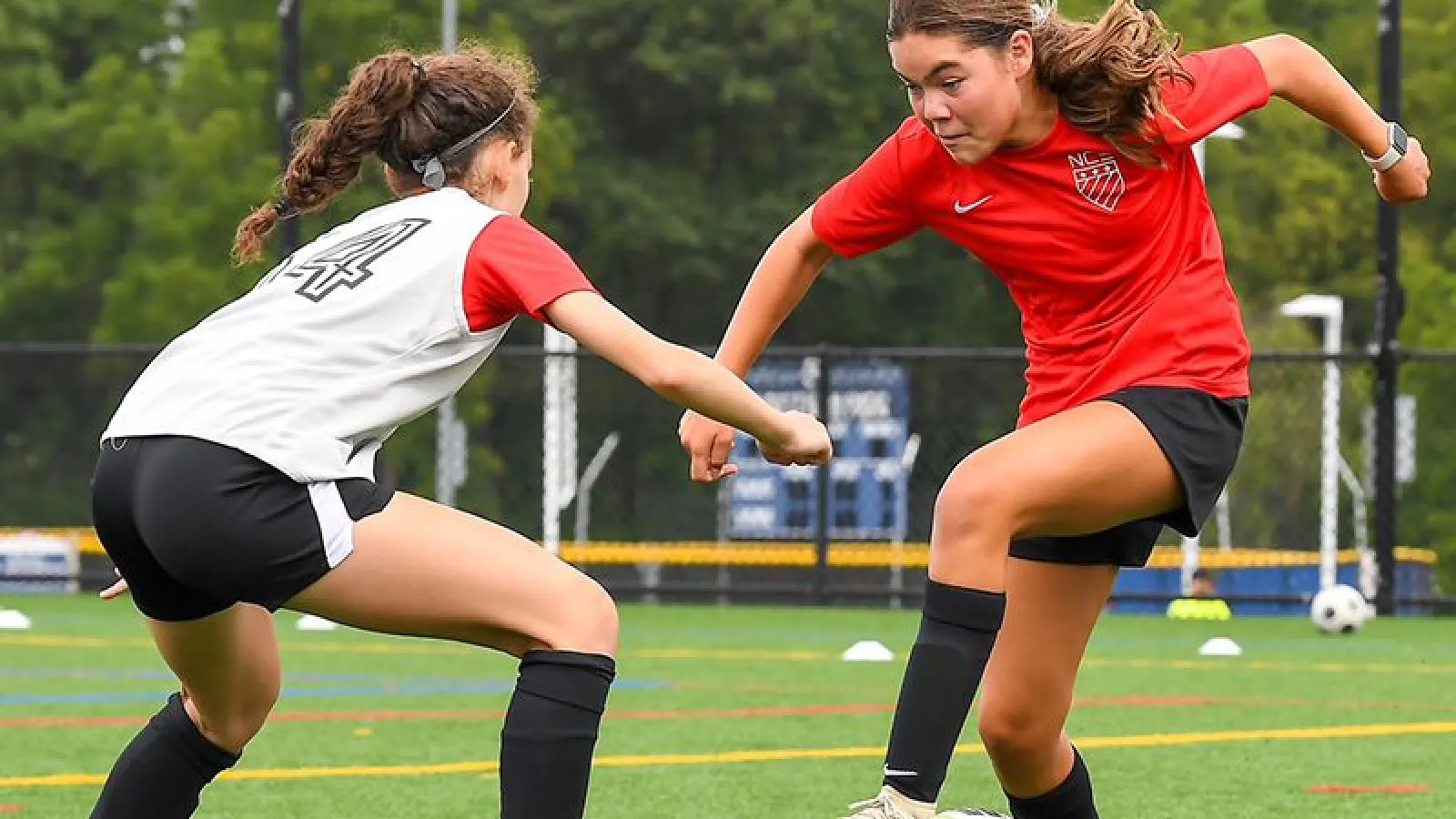 Women playing soccer