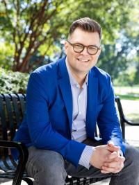 Dominik Stecula seated