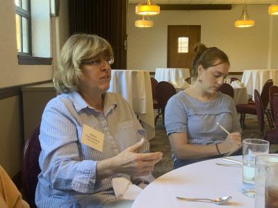 Woman talking at Lunch