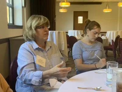 Woman talking at Lunch 
