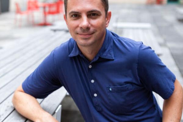 Dave DeAndrea sitting at table