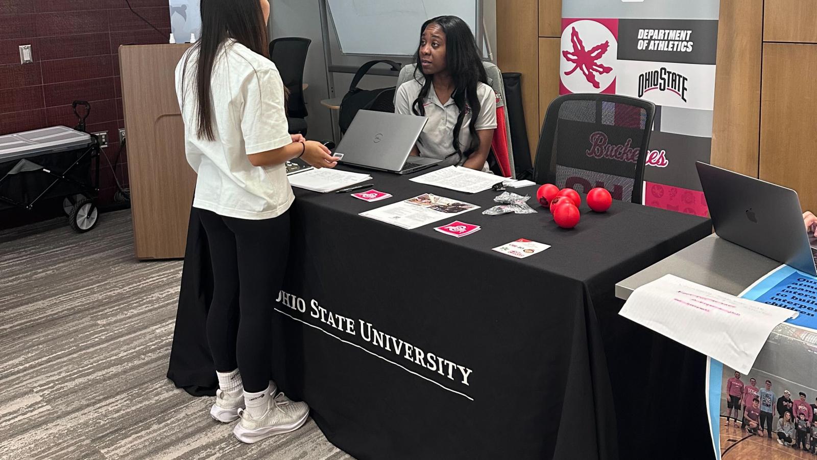 Athletics table at involvement fair